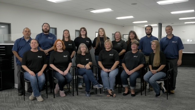 Team photo in office - seated