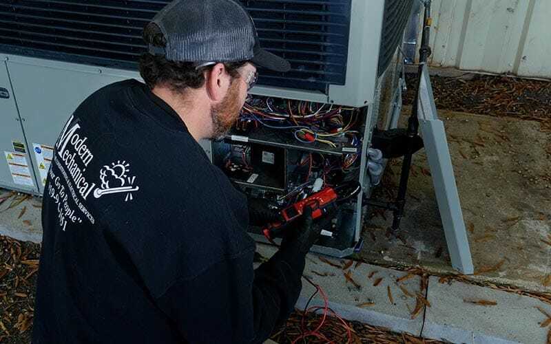 tech working on AC