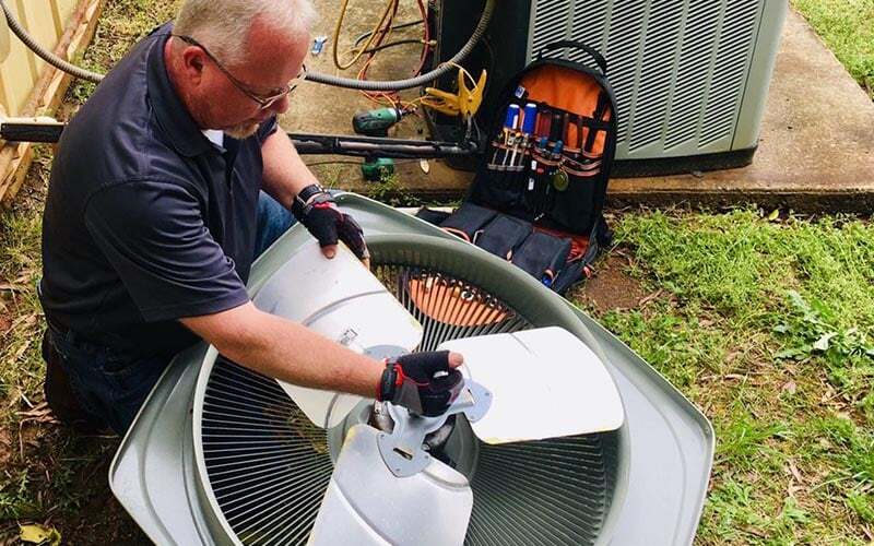 tech working on AC