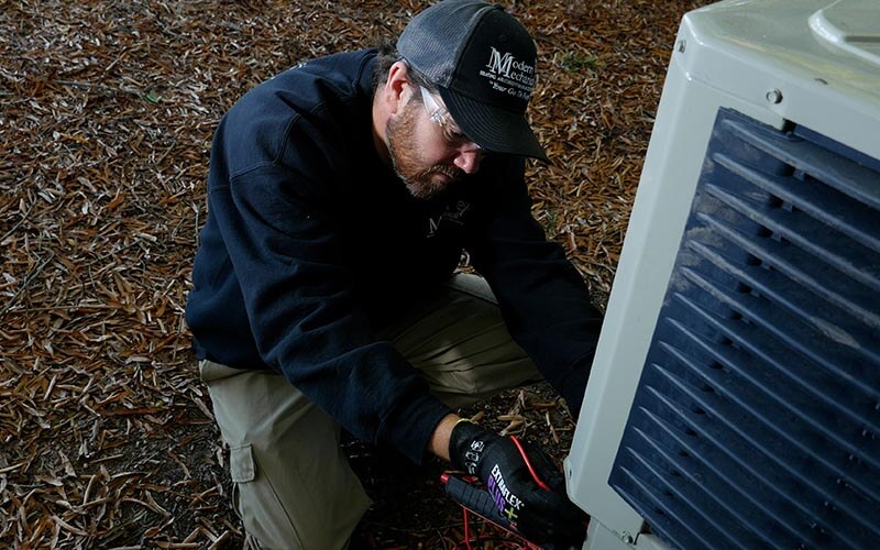 tech working on AC