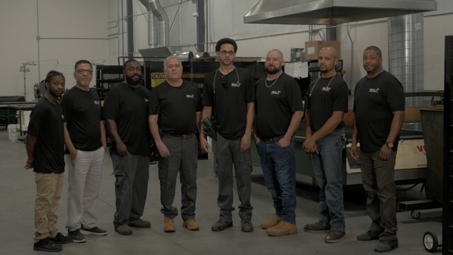 Team photo in warehouse