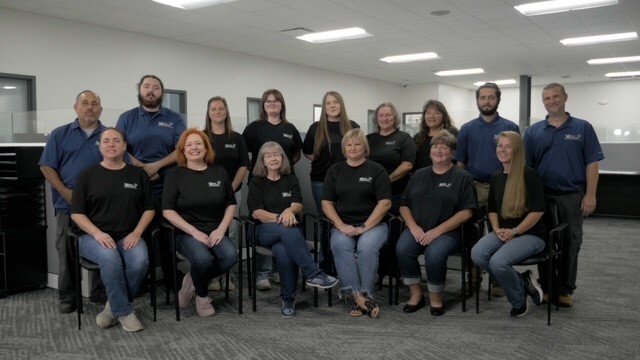 Team photo in office - seated